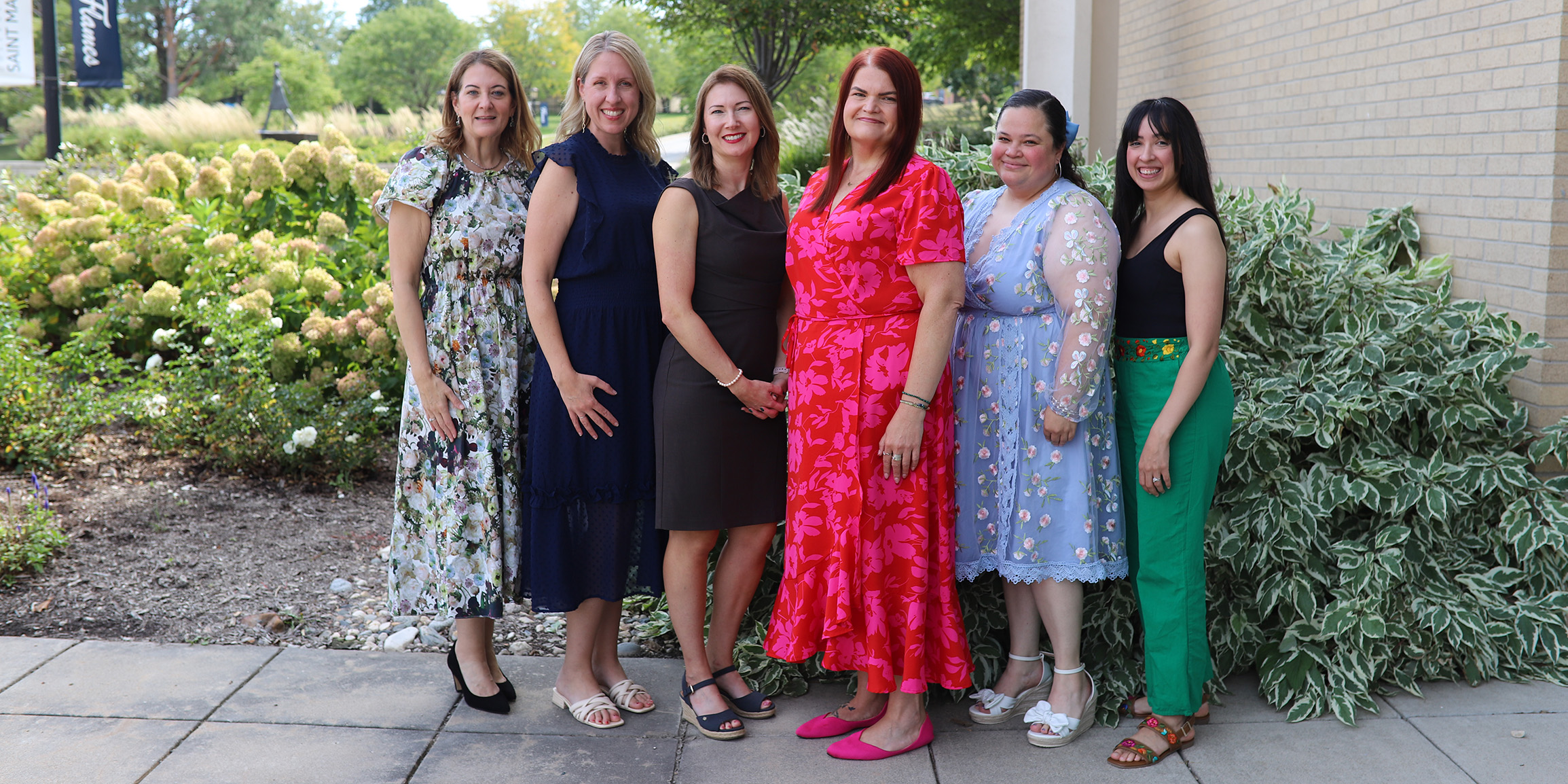 The alumni who received College of Saint Mary's Alumni Achievement Awards pose together after the ceremony in 2025.